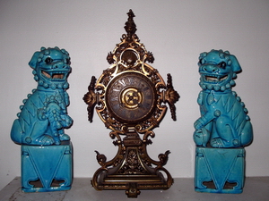 blue dogs and brass clock