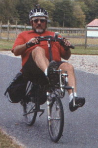On my Vision R55-GL63 recumbent at the Seagull Century, 2004 ... click for 5 tongues out